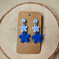 Blue Two Tone Flower Dangle Earrings